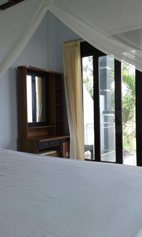 Kadek Homestay Амед Экстерьер фото